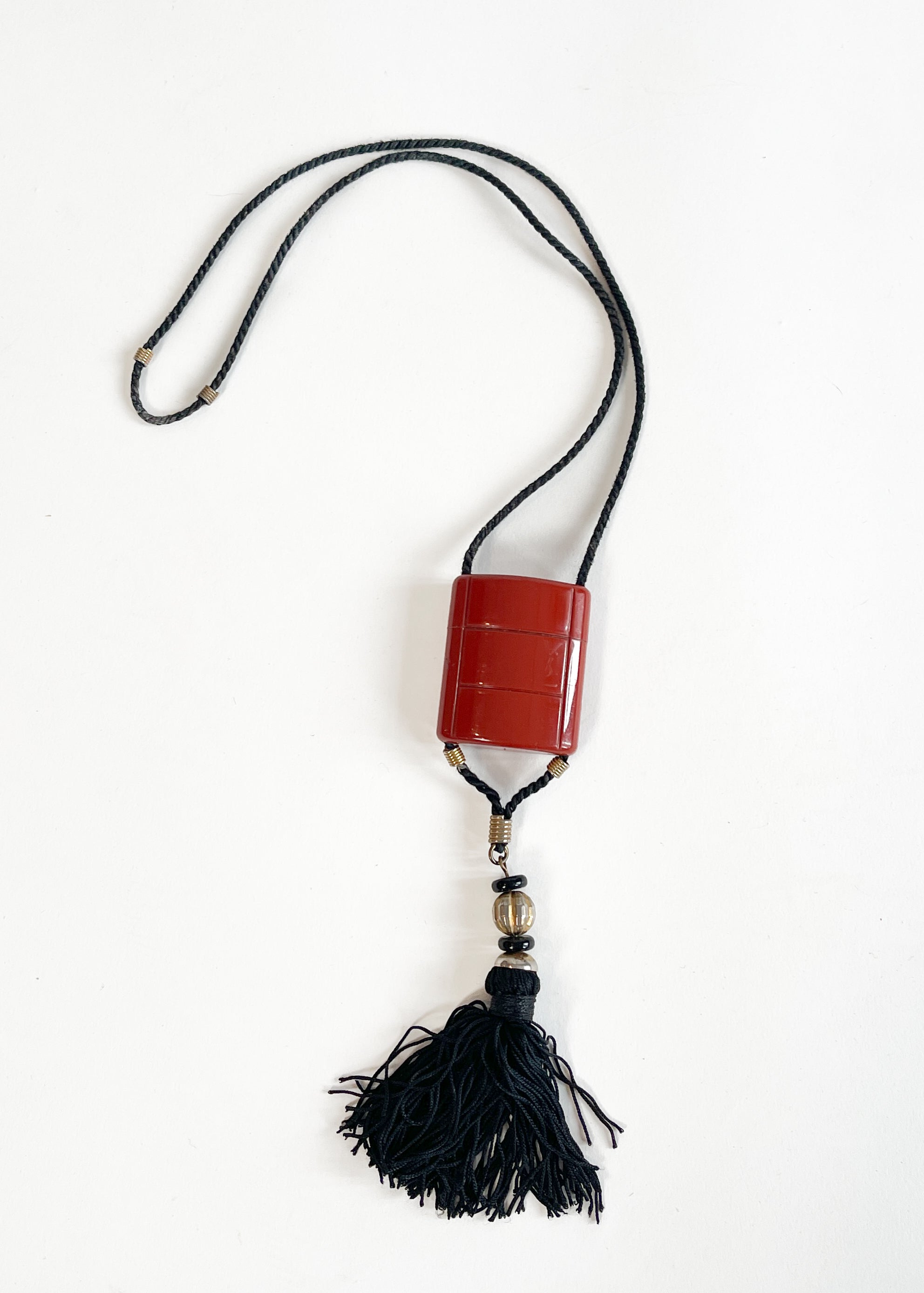 1970s YSL Opium Perfume Holder Necklace — Rust Plastic, Gold Beads
