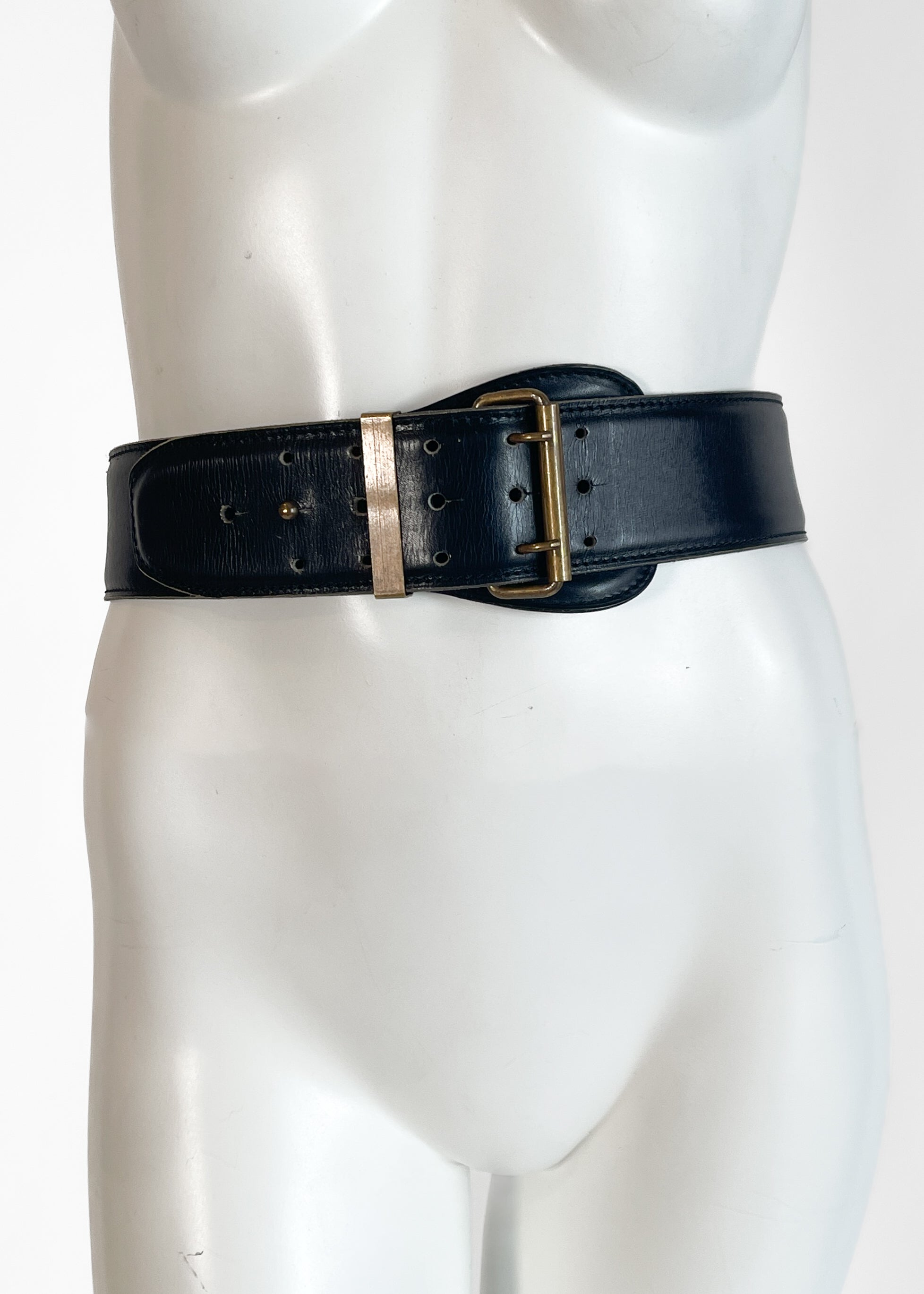Vintage 1987 Alaïa wide black leather belt on white mannequin, front view showing proportion