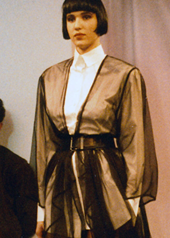 Model wearing vintage Alaïa wide black leather belt on the Fall/Winter 1987 runway