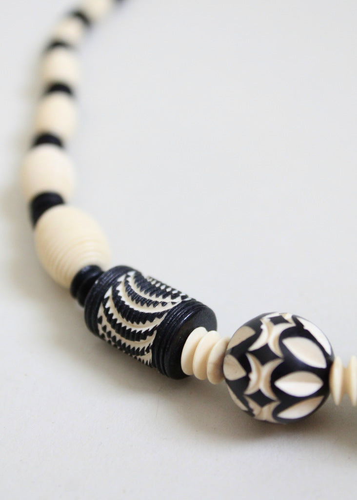 1930s carved celluloid necklace