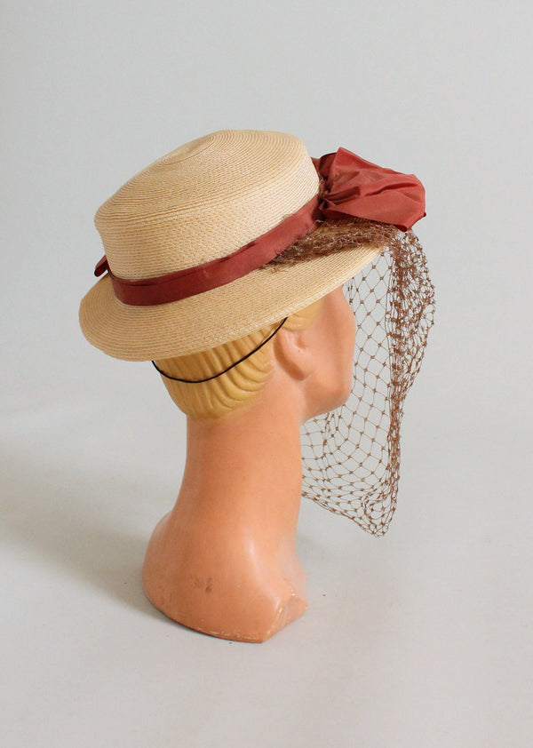 1940s_straw_boater_hat_with_fa