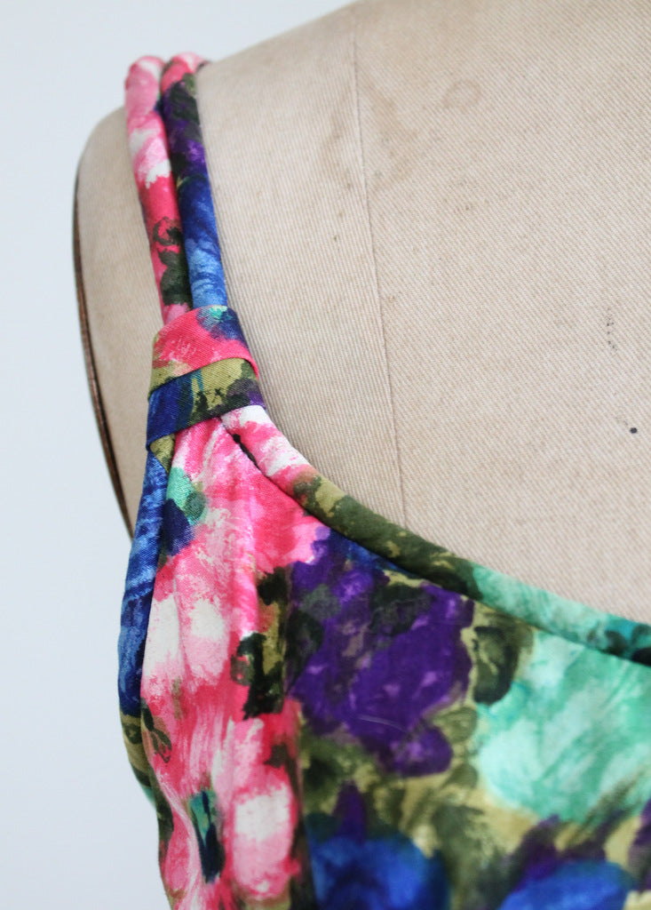 1950s pink, purple, and blue dress