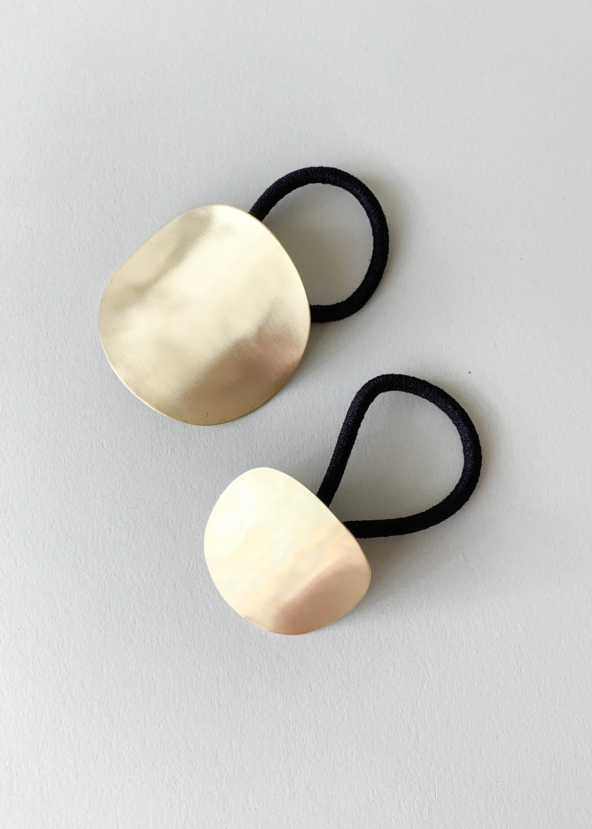 Sculpted Oval Brass Ponytail Holder