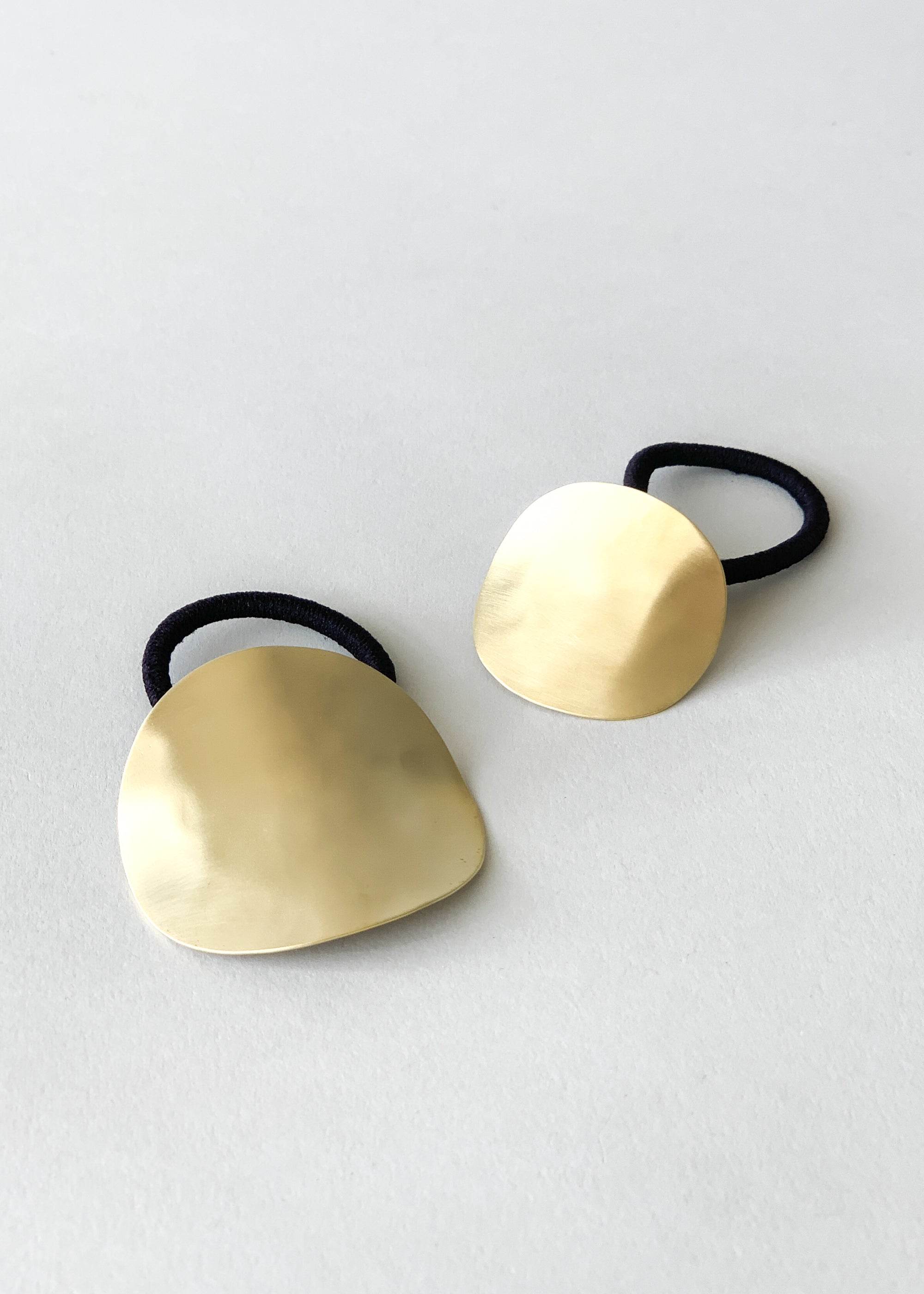 Sculpted Oval Brass Ponytail Holder